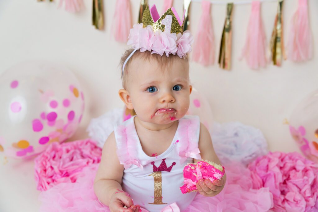 baby girl pink and gold cake smash session at Just Peachy Photography Baby Portrait Studio in Palatine IL